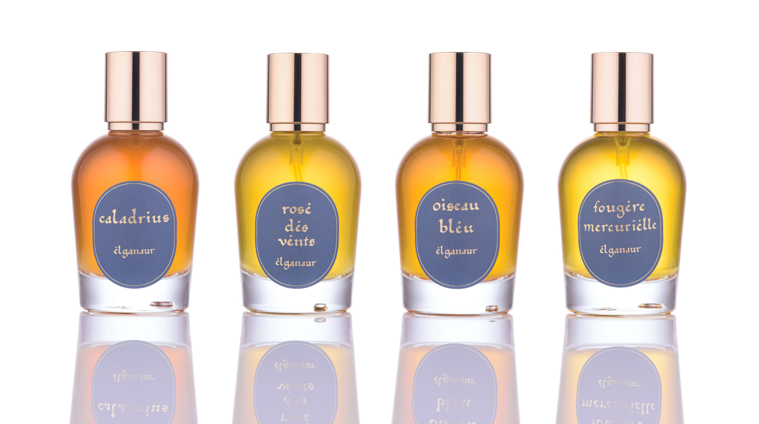 Quatre flacons de parfums botaniques naturels de la maison suisse Elganaur.